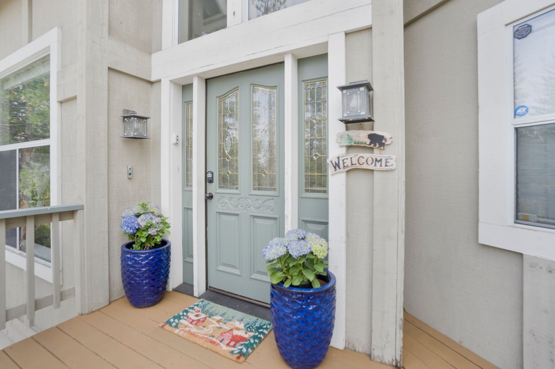 Front entry with planters either side of the door.